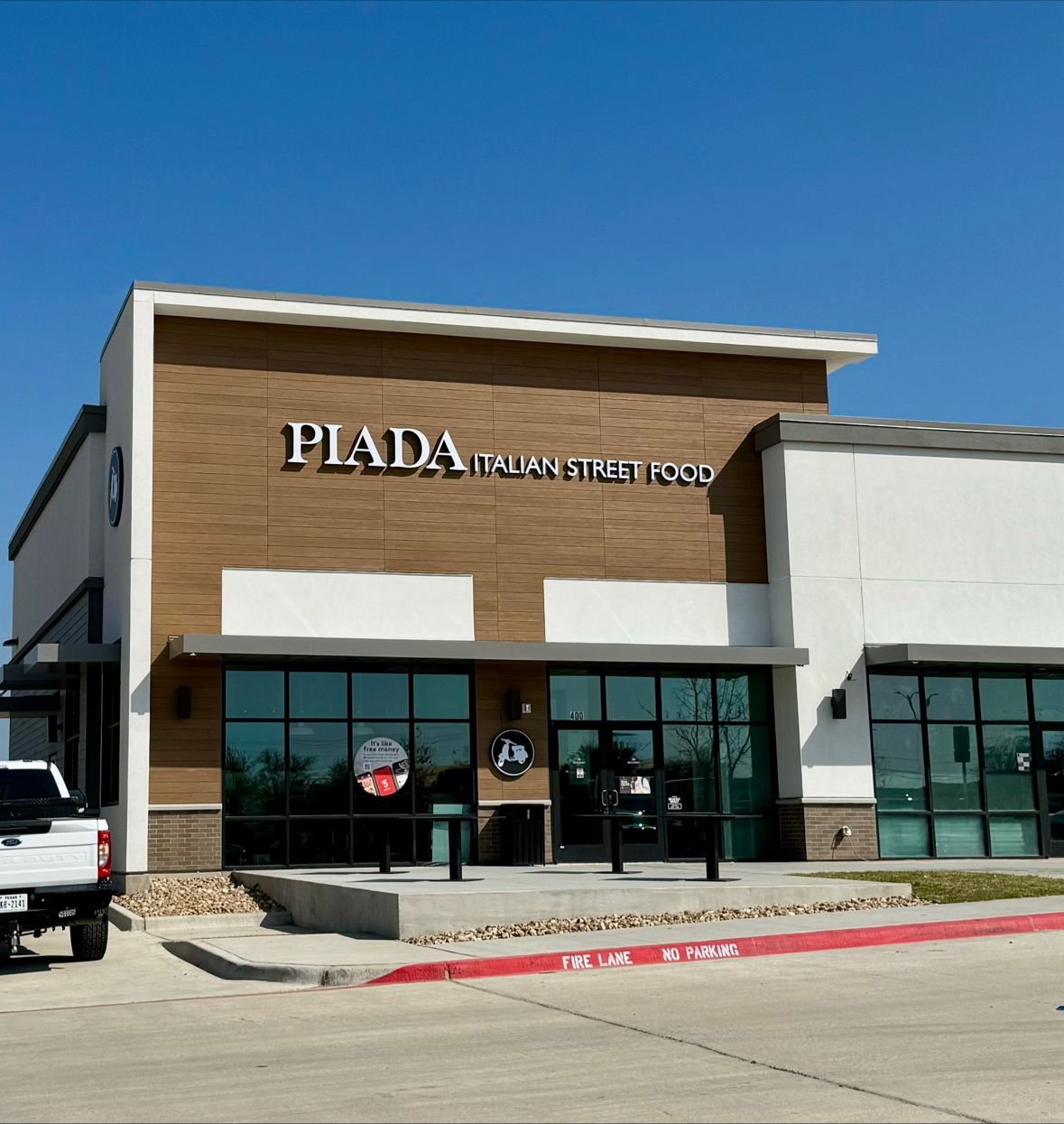 Piada Italian Street Food storefront with dimensional channel-letter sign