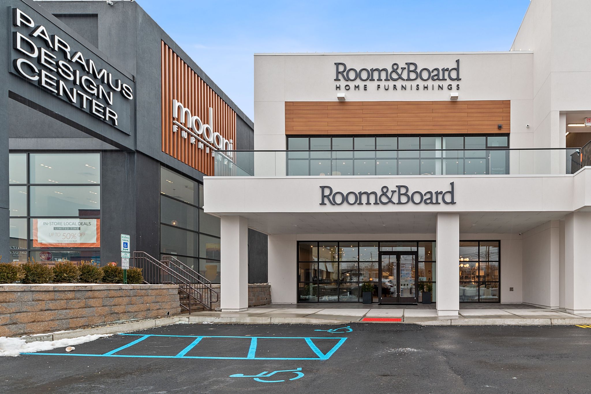 Room & Board home furnishings storefront — upper and lower channel-letter signs at Paramus Design Center